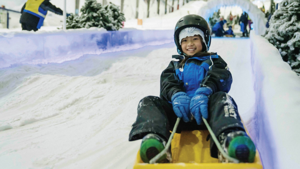 Child having fun at Snowplanet