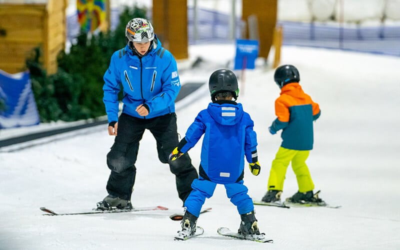 Kids learning to ski at Snowplanet birthday party