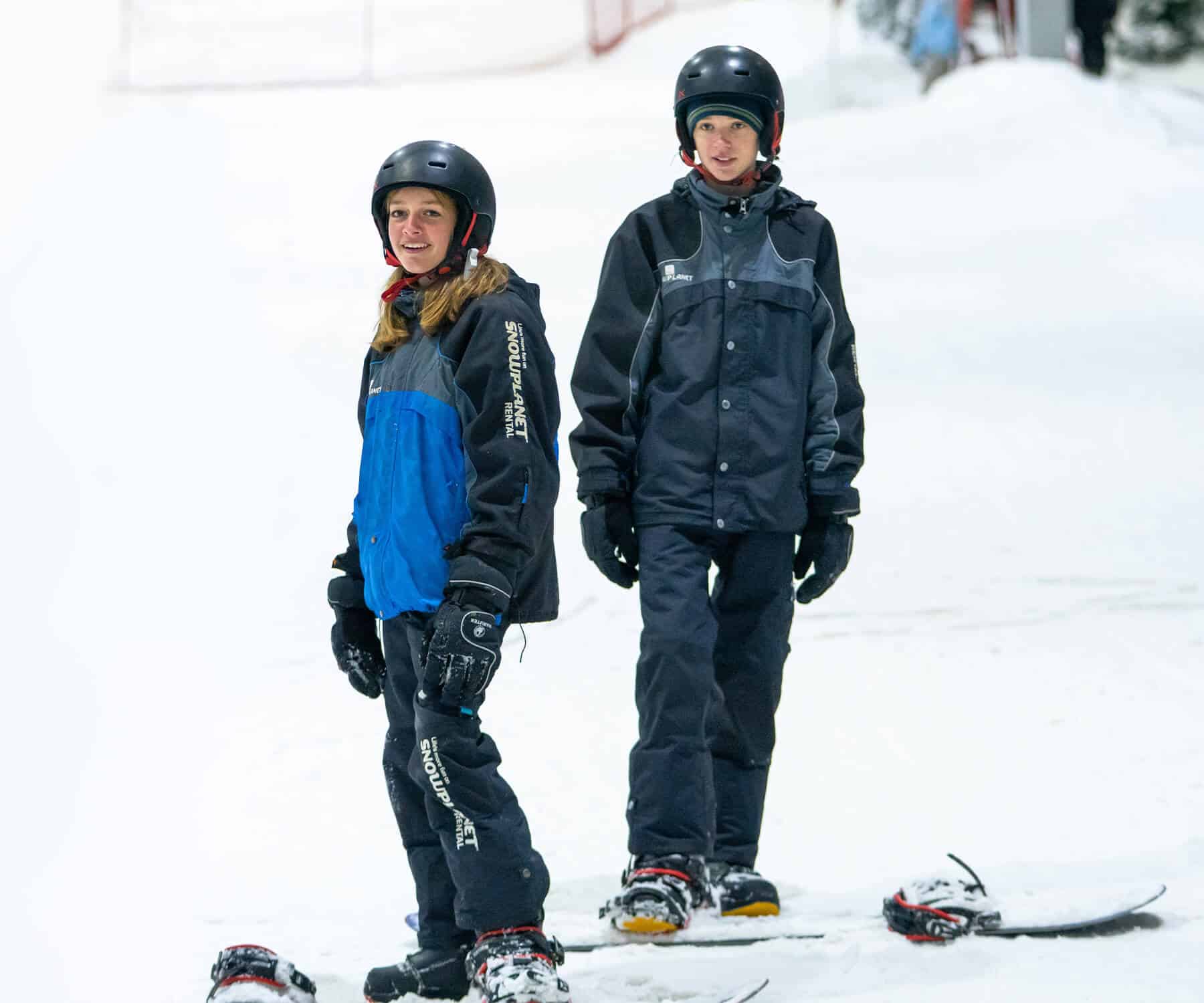teenagers snowboarding at Snowplanet