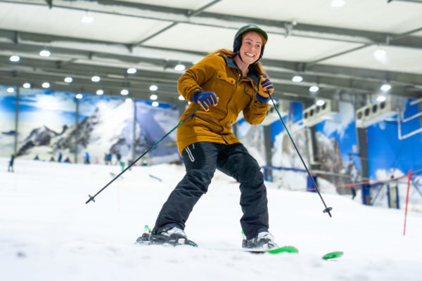 Snowplanet-girl-skiing-snow-slope