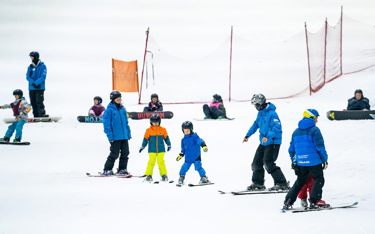 Kids skiing in the after school program at Auckland Snowplanet