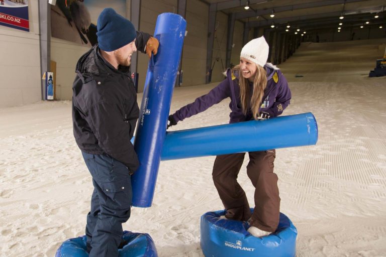 man and woman doing a fun team building activity in Auckland