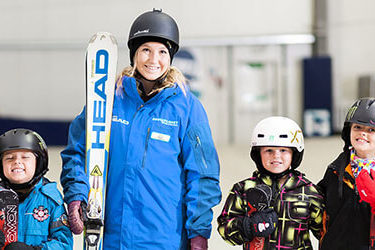 kids get a school holiday ski lesson at Snowplanet in Auckland